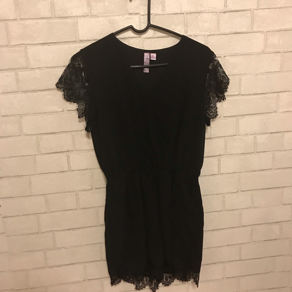 Francesca’s black lace romper